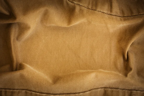 Brown fabric texture background, material of textile industrial