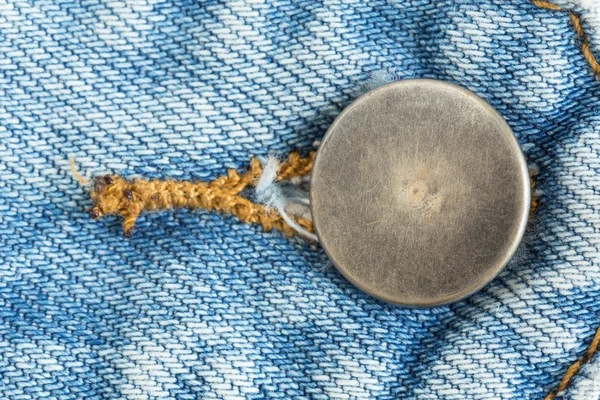 Old metal button of jeans fashion