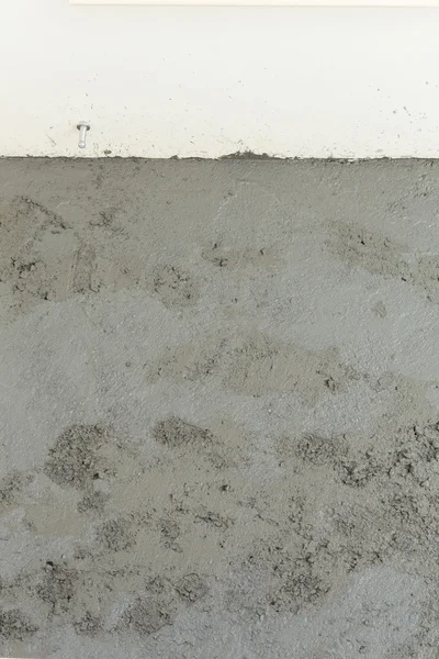 Wet cement texture in building construction site for background