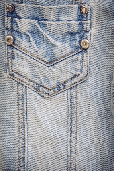 Jean shirt with pocket and metal button on clothing textile
