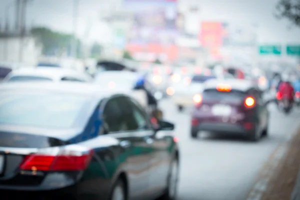 Car driving on road with traffic jam in the city