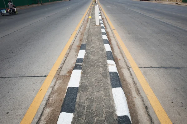 Black asphalt concrete road with two lane