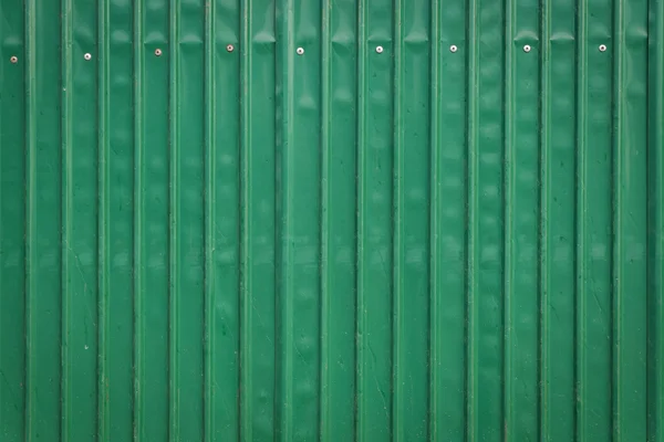 Steel metallic old door, green grunge metal background