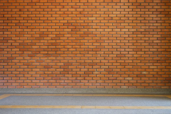 Brick wall texture background and small gravel stone washed