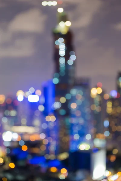 Blurred bokeh lights background city office downtown