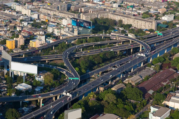 Aerial view highway interchanged and city downtown