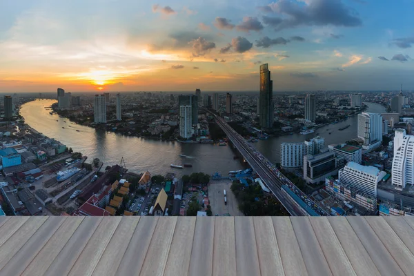 Bangkok main river cross over city downtown with dramatic sky after sunset