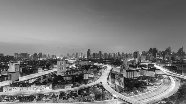 Black and White, Aerial view highway interchanged with city downtown