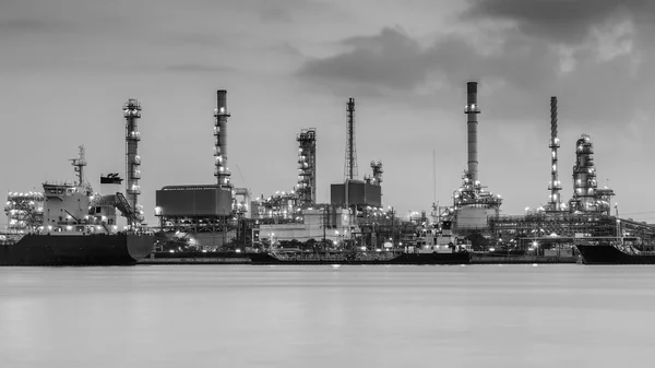 Black and White, Petroleum refinery riverfront