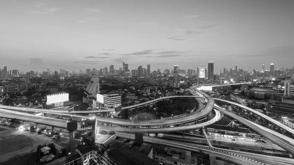 Black and White, highway interchanged with city downtown