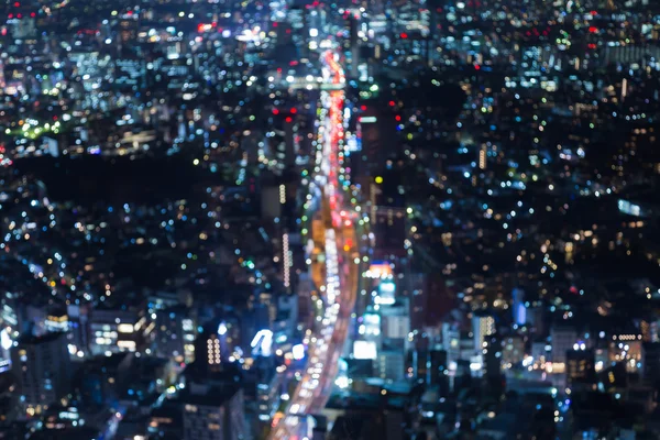 Aerial view blurred lights Tokyo city downtown road night