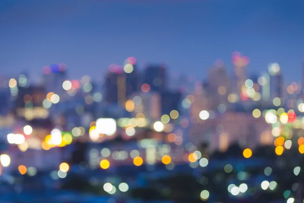 Abstract blur bokeh of city skyline during twilight