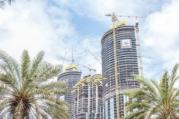 Three skyscrapers under construction in Dubai.