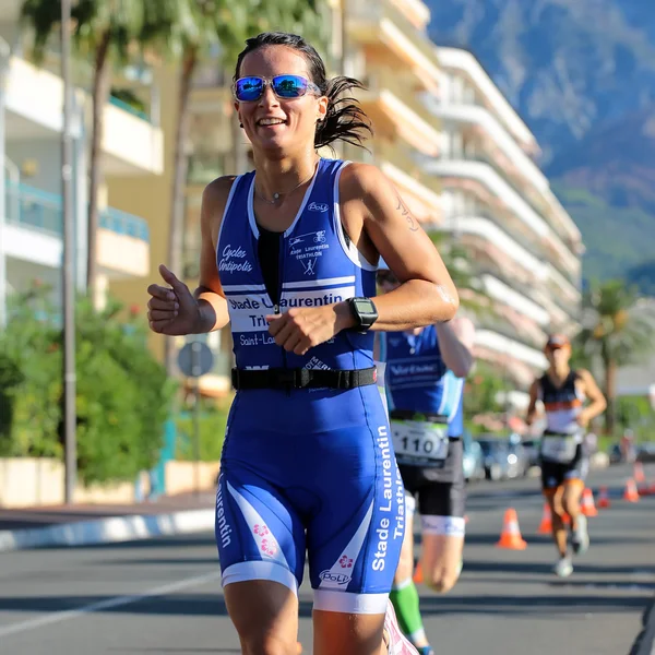 Woman runner in blue suit