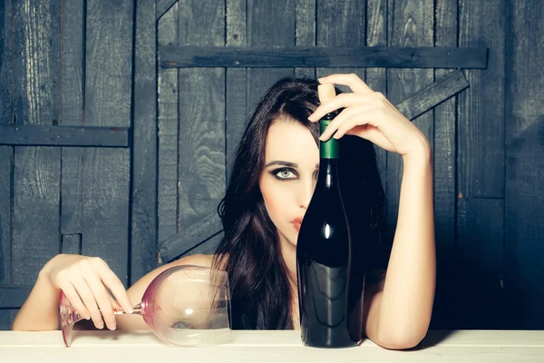 Sexy woman with wine