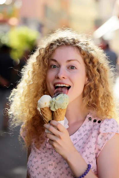 Smiling woman with ice cream