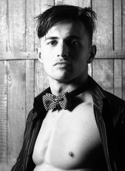 Man in shirt and bow tie