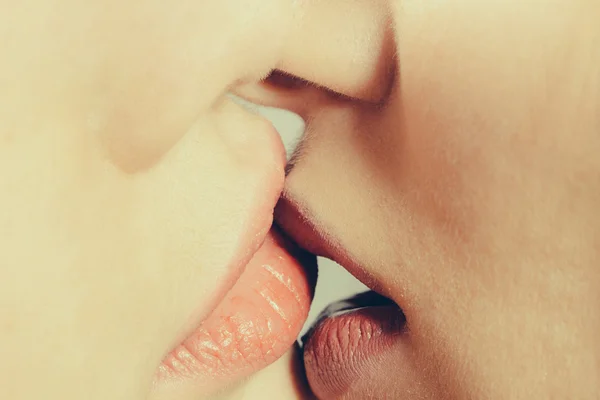 Female lips kissing