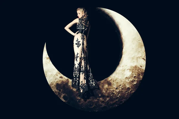 Woman in dress on moon