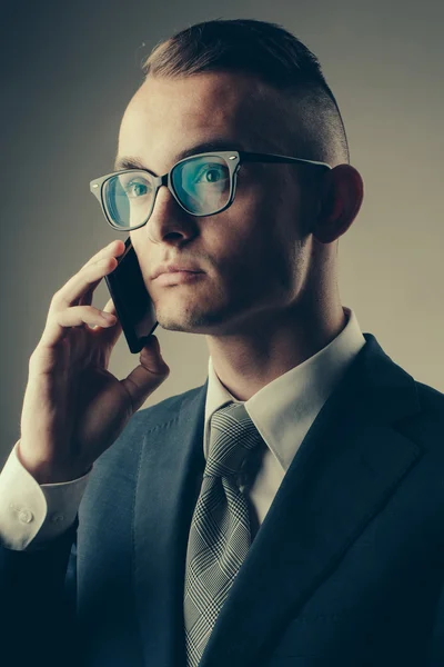 Guy in glasses with mobile phone