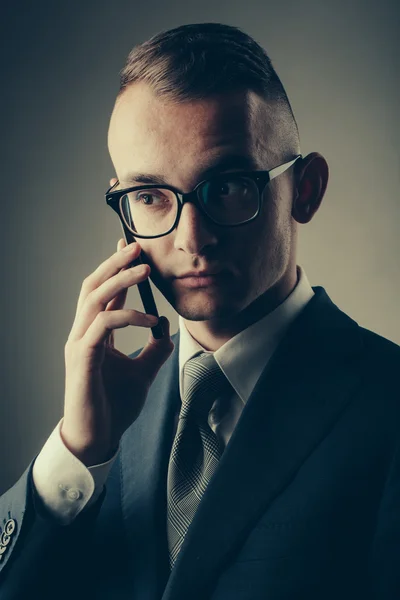 Guy in glasses with mobile phone