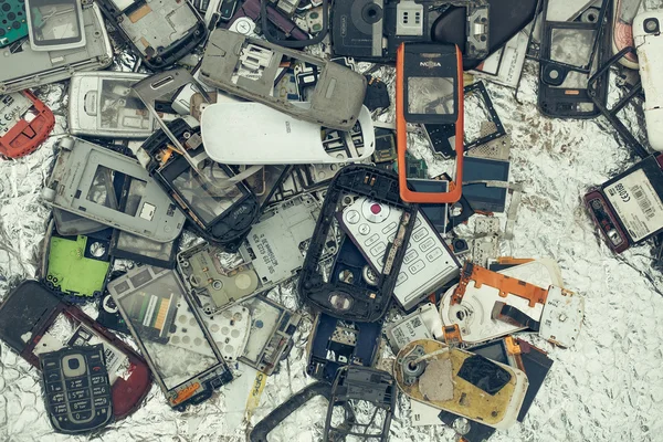 Trash pile of old mobile phones