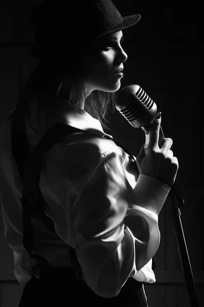 Retro woman with microphone