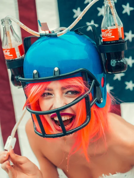 Independence day woman with flag and drink helmet