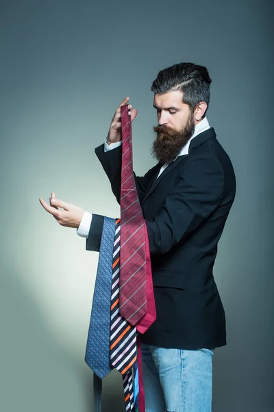 Young man with ties