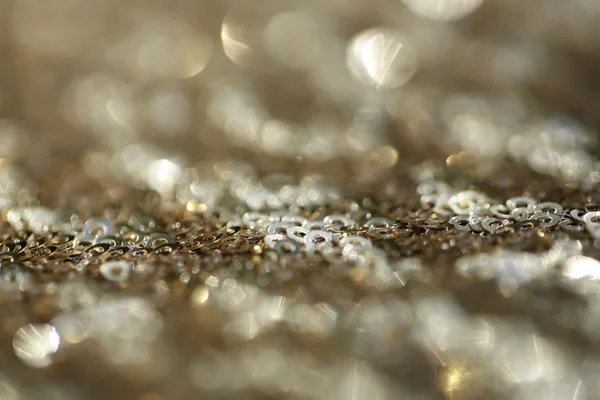 Silver sequins blurred bokeh background