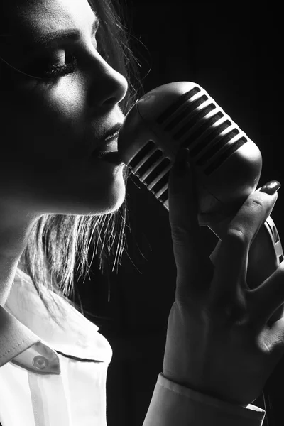 Sexy woman with microphone