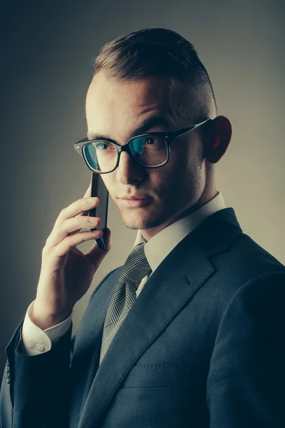 Guy in glasses with mobile phone