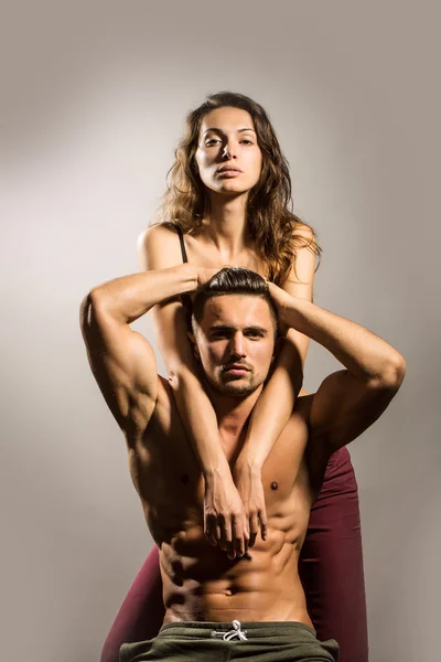 Sexy young couple in studio