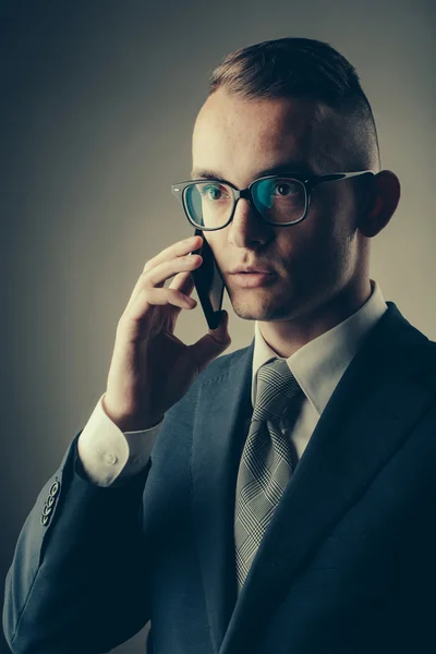 Guy in glasses with mobile phone