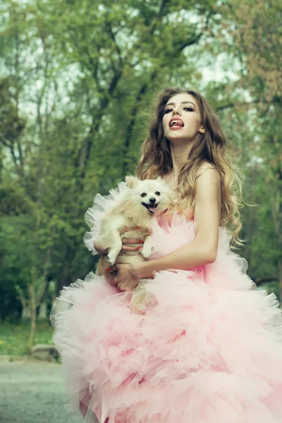 Fashionable woman with dog