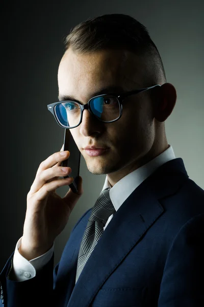 Guy in glasses with mobile phone