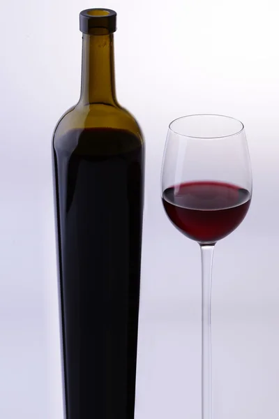 Wine bottle and glass