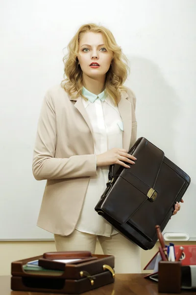 Solid business woman with bag