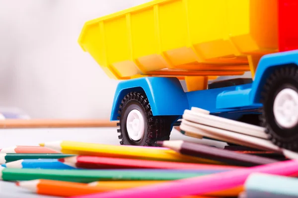 Colorful school stationary and car