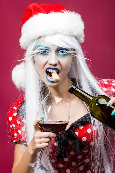 Christmas woman with wine