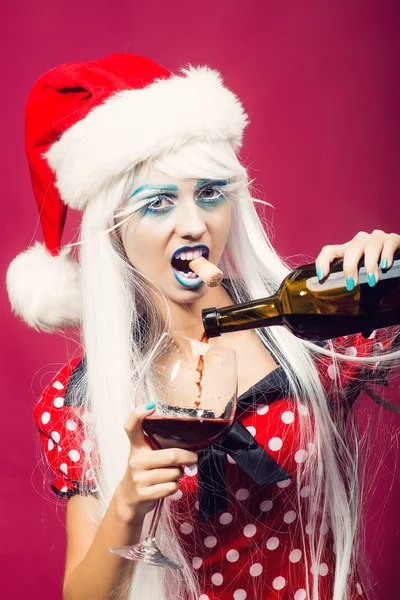 Christmas woman with wine