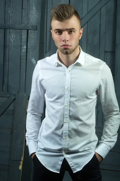 Young man in white shirt