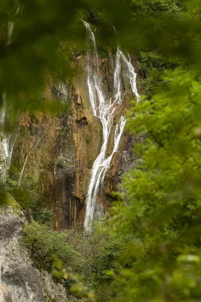 Beautiful waterfalls among green mountains