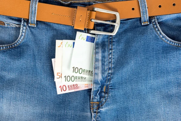 Close-up of one hundred and fifty Euro banknote in jeans zipped.
