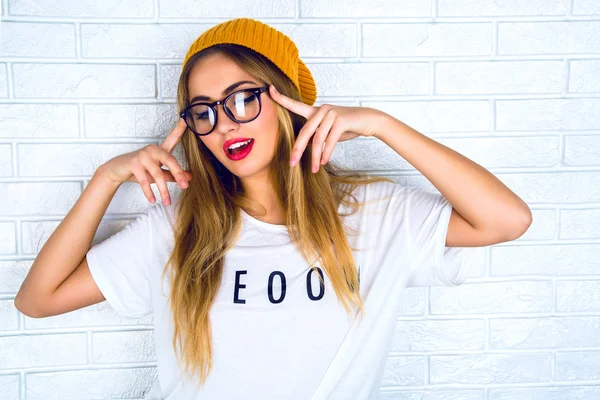 Portrait of young hipster blonde woman