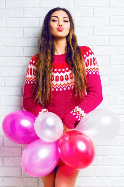 Young woman in casual trendy sweater