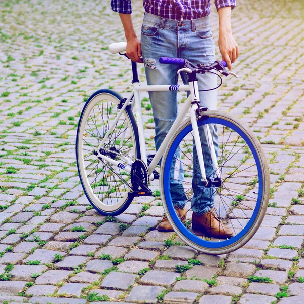 Man posing with modern bike