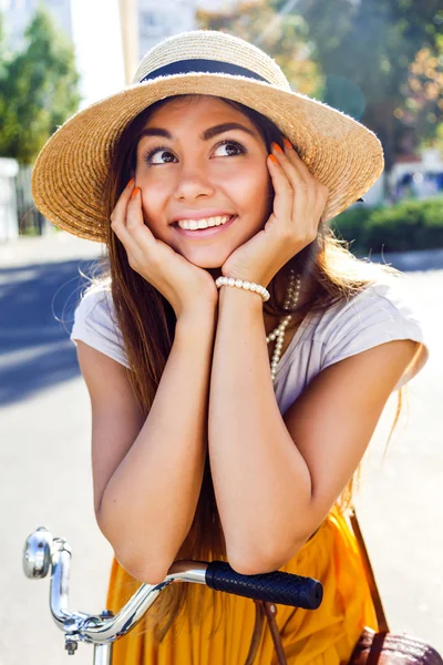 Portrait of young pretty dreaming girl