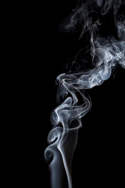 Abstract of smoke dance on a black background.