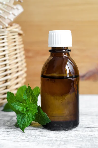 Small bottle of essential mint oil